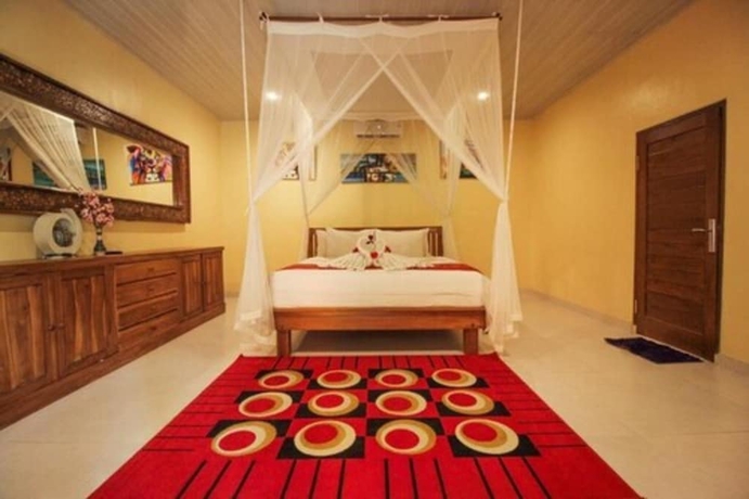 Imagen de la habitación del Hotel Pondok Kutuh Guesthouse. Foto 8