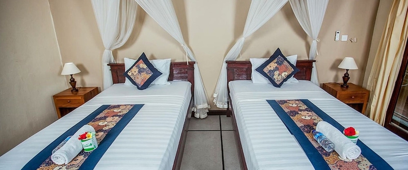 Imagen de la habitación del Hotel Pondok Kutuh Guesthouse. Foto 10
