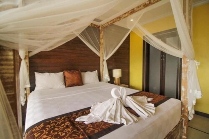 Imagen de la habitación del Hotel Pondok Kutuh Guesthouse. Foto 17