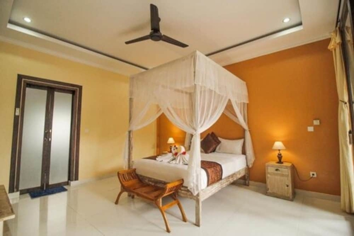Imagen de la habitación del Hotel Pondok Kutuh Guesthouse. Foto 19