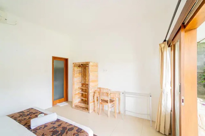 Imagen de la habitación del Hotel Pondok Lulik Homestay Canggu. Foto 13