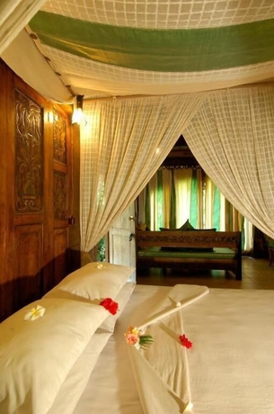 Imagen de la habitación del Hotel Pondok Sari Beach & Spa Resort. Foto 4