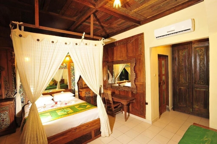 Imagen de la habitación del Hotel Pondok Sari Beach & Spa Resort. Foto 8