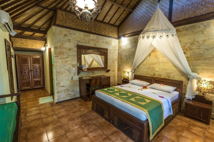 Imagen de la habitación del Hotel Pondok Sari Beach & Spa Resort. Foto 9