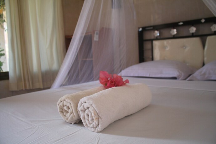 Imagen de la habitación del Hotel Pondok Sunrise 2. Foto 19