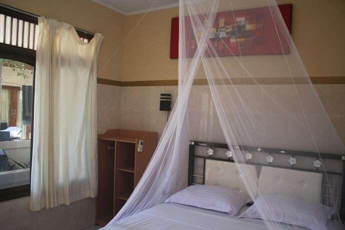 Imagen de la habitación del Hotel Pondok Sunrise 2. Foto 36