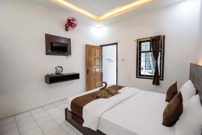 Imagen de la habitación del Hotel Pondok Tetebatu Cottages and Cafe. Foto 7