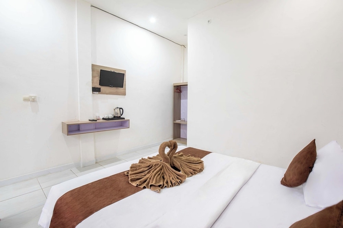 Imagen de la habitación del Hotel Pondok Tetebatu Cottages and Cafe. Foto 9