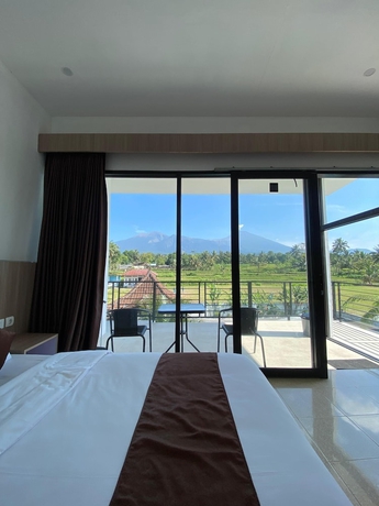 Imagen de la habitación del Hotel Pondok Tetebatu Cottages and Cafe. Foto 15