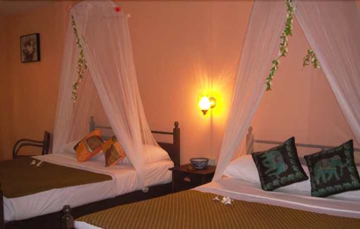 Imagen de la habitación del Hotel Pongsuda Chalet. Foto 10