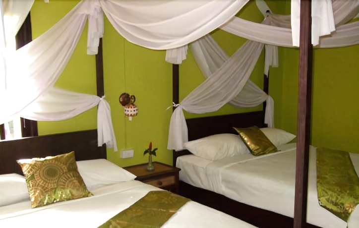Imagen de la habitación del Hotel Pongsuda Chalet. Foto 11