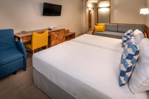 Imagen de la habitación del Hotel Ponient Dorada Palace by PortAventura World. Foto 4