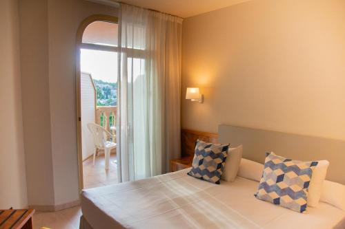Imagen de la habitación del Hotel Ponient Dorada Palace by PortAventura World. Foto 5