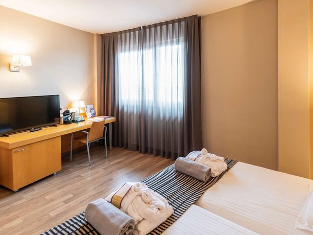 Imagen de la habitación del Hotel Ponient Vila Centric by PortAventura World. Foto 17