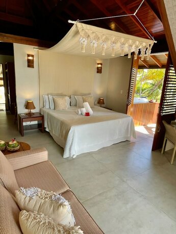 Imagen de la habitación del Hotel Pontal dos Carneiros Beach Bungalows. Foto 14
