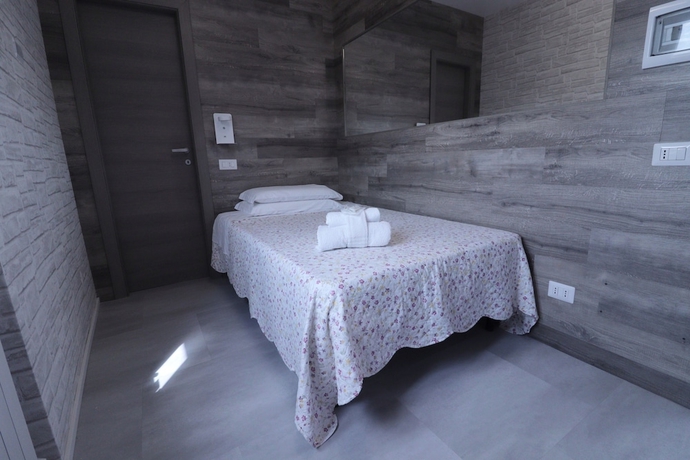 Imagen de la habitación del Hotel Pontenuovo. Foto 9