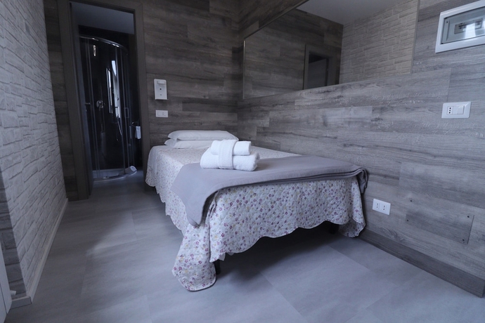 Imagen de la habitación del Hotel Pontenuovo. Foto 10