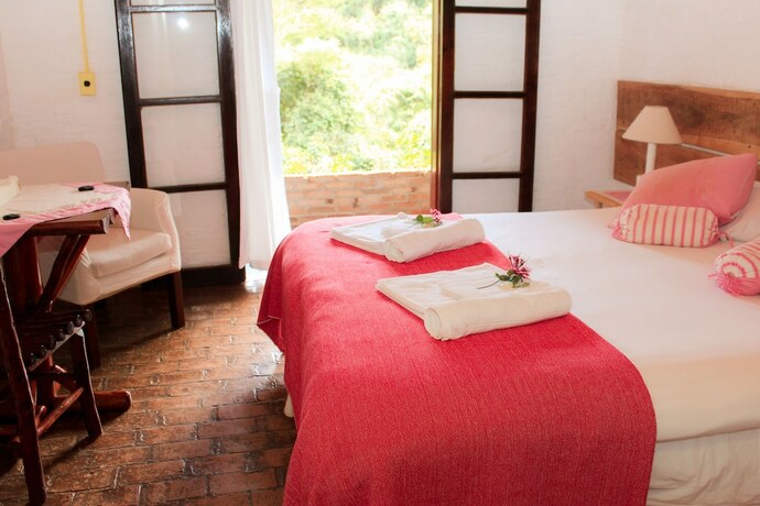 Imagen de la habitación del Hotel Ponto de Luz. Foto 17