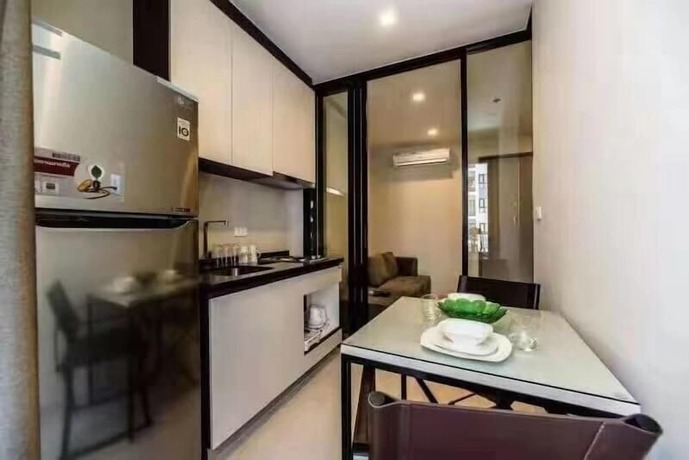 Imagen de la habitación del Hotel Pony's Homestay -the Base Condo-. Foto 7