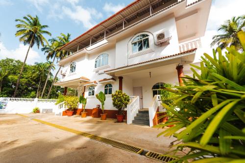 Imagen general del Hotel Pool Side Cottages. Foto 5