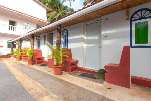 Imagen general del Hotel Pool Side Cottages. Foto 6
