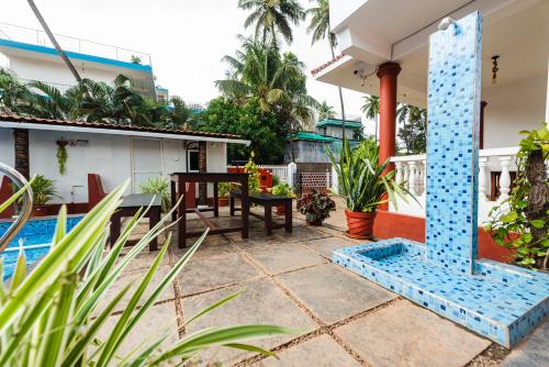 Imagen general del Hotel Pool Side Cottages. Foto 7