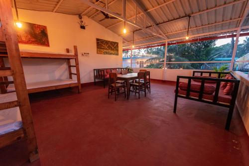 Imagen general del Hotel Pool Side Cottages. Foto 17