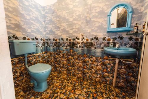 Imagen de la habitación del Hotel Pool Side Cottages. Foto 19