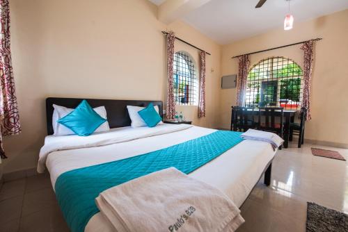 Imagen de la habitación del Hotel Pool Side Cottages. Foto 20