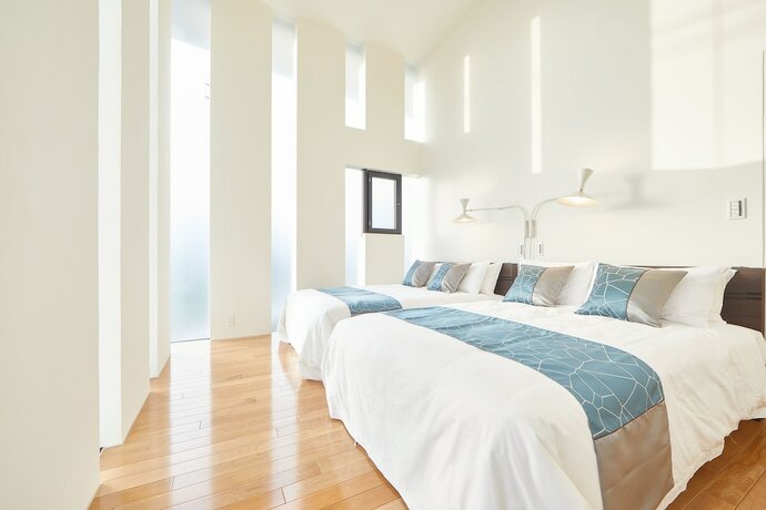 Imagen de la habitación del Hotel Pool and Sauna Villa Churaumi Motobu. Foto 30