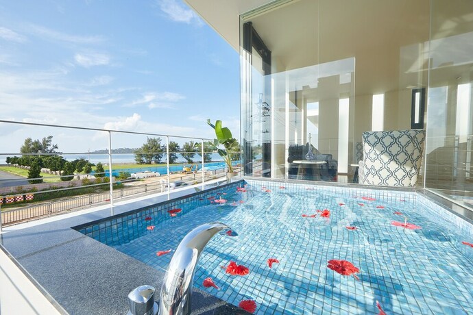 Imagen de la habitación del Hotel Pool and Sauna Villa Churaumi Motobu. Foto 31