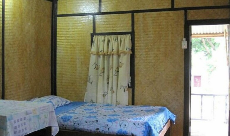 Imagen de la habitación del Hotel Pooltrap Village Bungalow. Foto 18