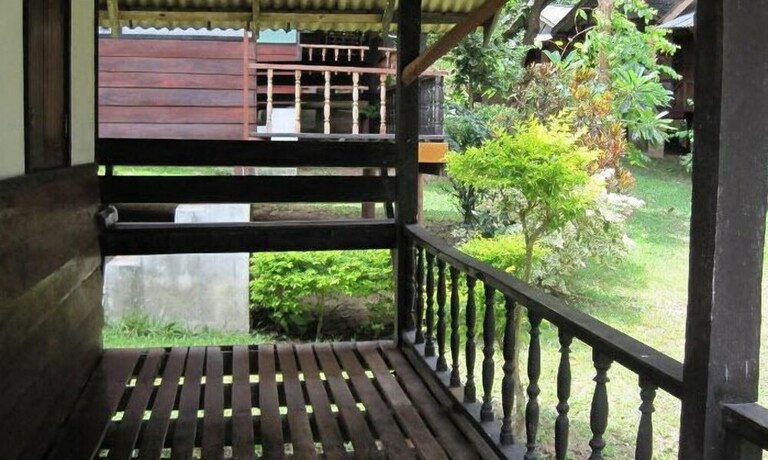 Imagen de la habitación del Hotel Pooltrap Village Bungalow. Foto 24