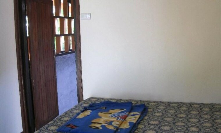 Imagen de la habitación del Hotel Pooltrap Village Bungalow. Foto 26