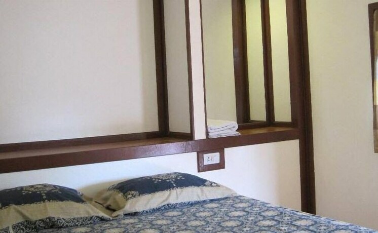 Imagen de la habitación del Hotel Pooltrap Village Bungalow. Foto 31