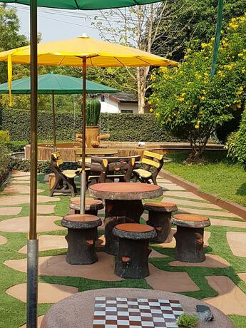 Imagen de los exteriores del Hotel Poolvilla Chiangmai. Foto 36