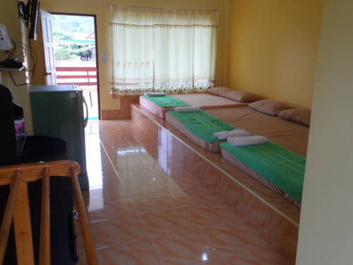 Imagen de la habitación del Hotel Pooma Resort. Foto 8
