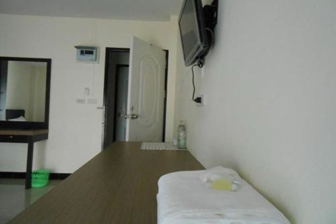 Imagen de la habitación del Hotel Poomsiri Place. Foto 3
