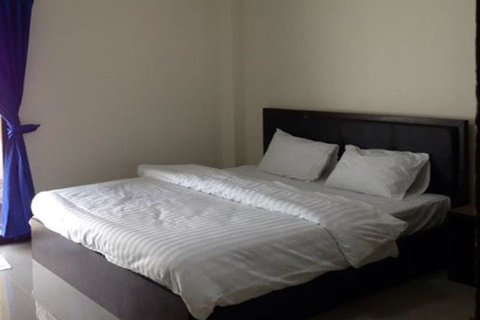 Imagen de la habitación del Hotel Poomsiri Place. Foto 6