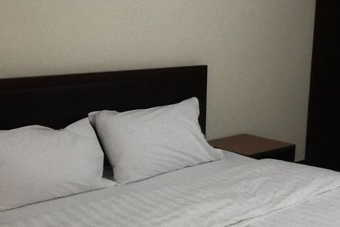 Imagen de la habitación del Hotel Poomsiri Place. Foto 7