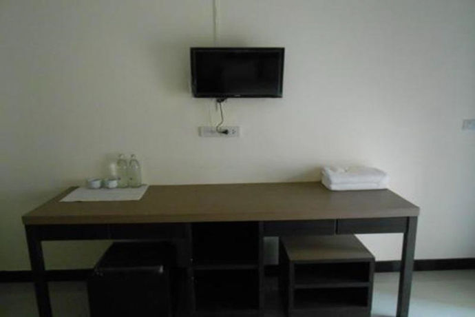 Imagen de la habitación del Hotel Poomsiri Place. Foto 10