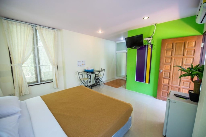 Imagen de la habitación del Hotel Poomvarin Resort. Foto 11