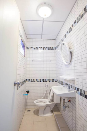 Imagen de la habitación del Hotel Poon Sook Apartment. Foto 3