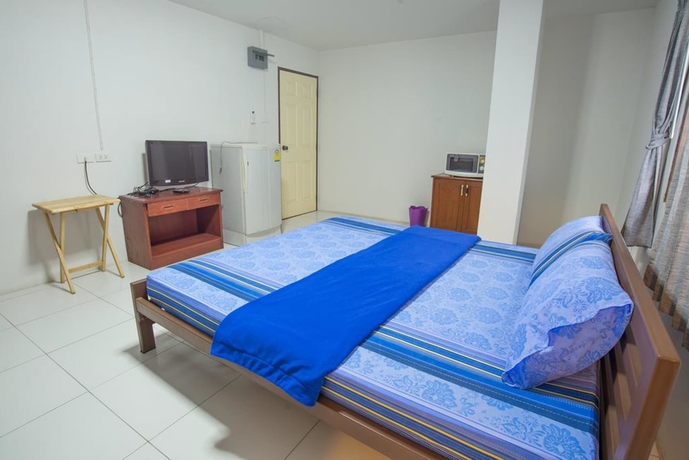 Imagen de la habitación del Hotel Poon Sook Apartment. Foto 7