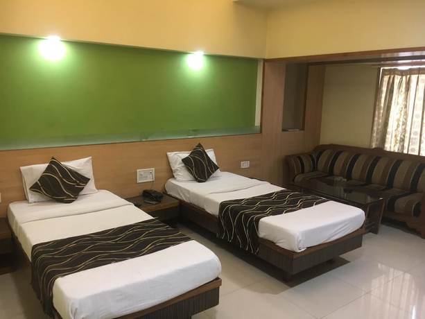 Imagen de la habitación del Hotel Poonam. Foto 15