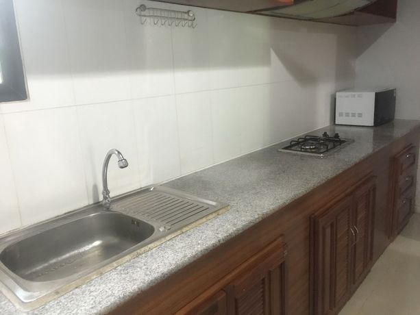Imagen de la habitación del Hotel Poonsap Apartment. Foto 9