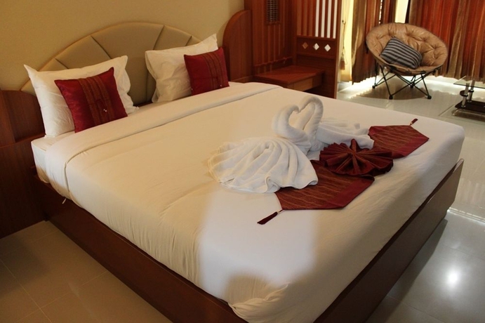 Imagen de la habitación del Hotel Poonsook Resident. Foto 5
