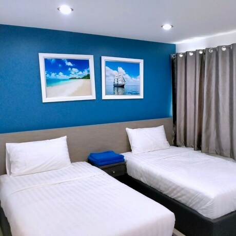 Imagen de la habitación del Hotel Poonsuk Place. Foto 15