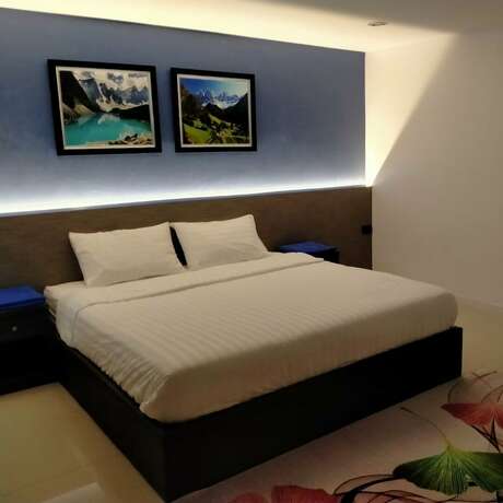Imagen de la habitación del Hotel Poonsuk Place. Foto 18