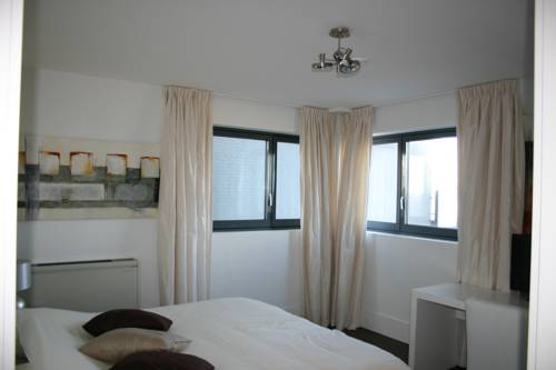 Imagen de la habitación del Hotel Poort Beach Apartments. Foto 3